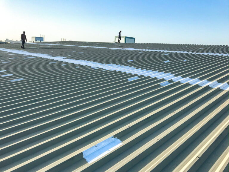 Roof sheeting and cladding replacement over a live facility